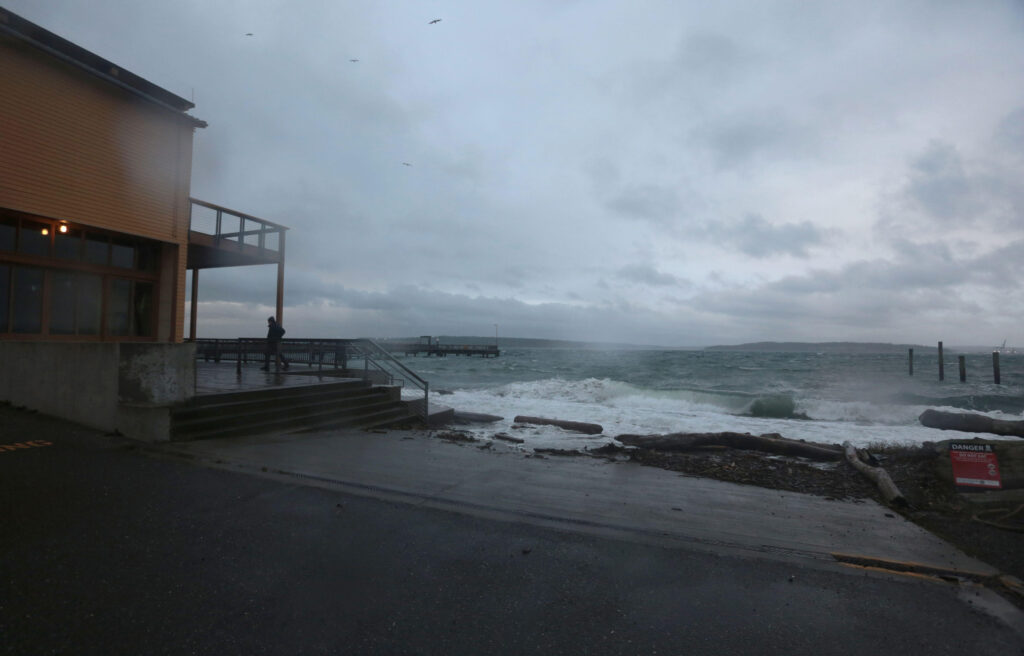 a building next to a body of water (MyCoast AI)