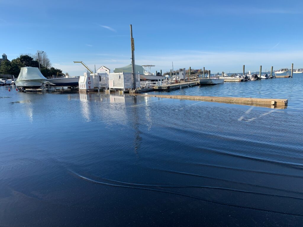 a body of water with boats in it and buildings in the back (MyCoast AI)