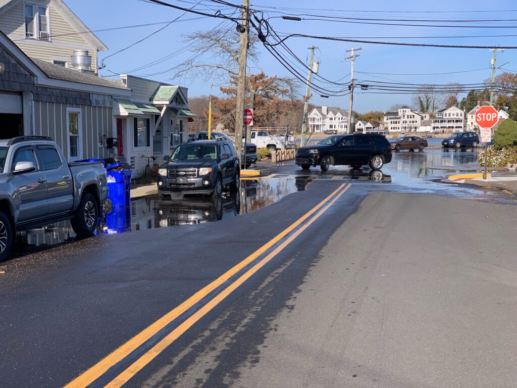 a flooded street with cars (MyCoast AI)