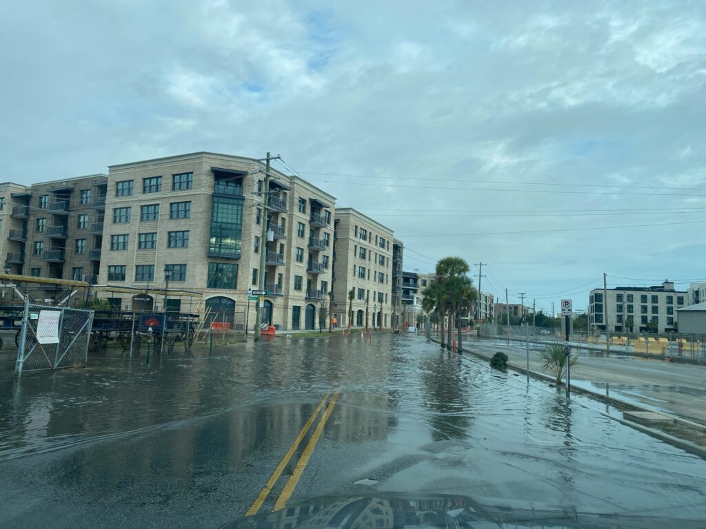 a building with a parking lot (MyCoast AI)