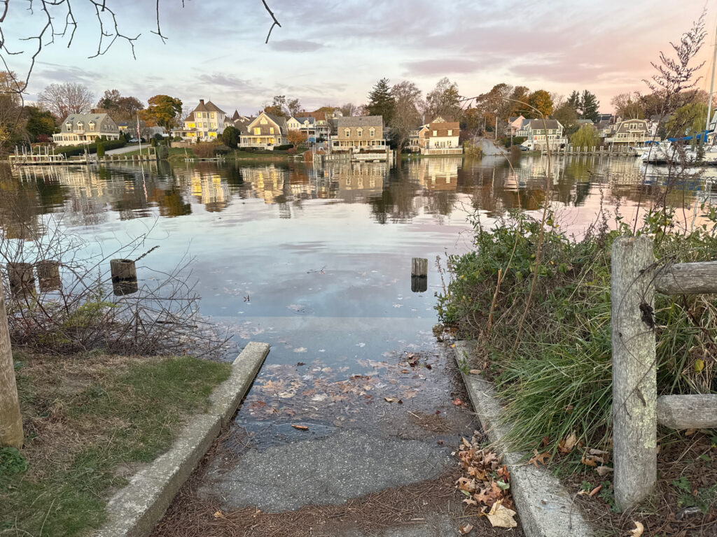 a body of water with houses along it (MyCoast AI)
