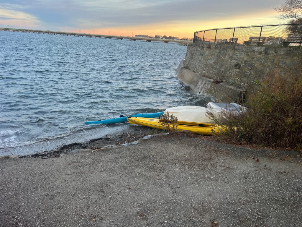 a yellow boat on the shore (MyCoast AI)
