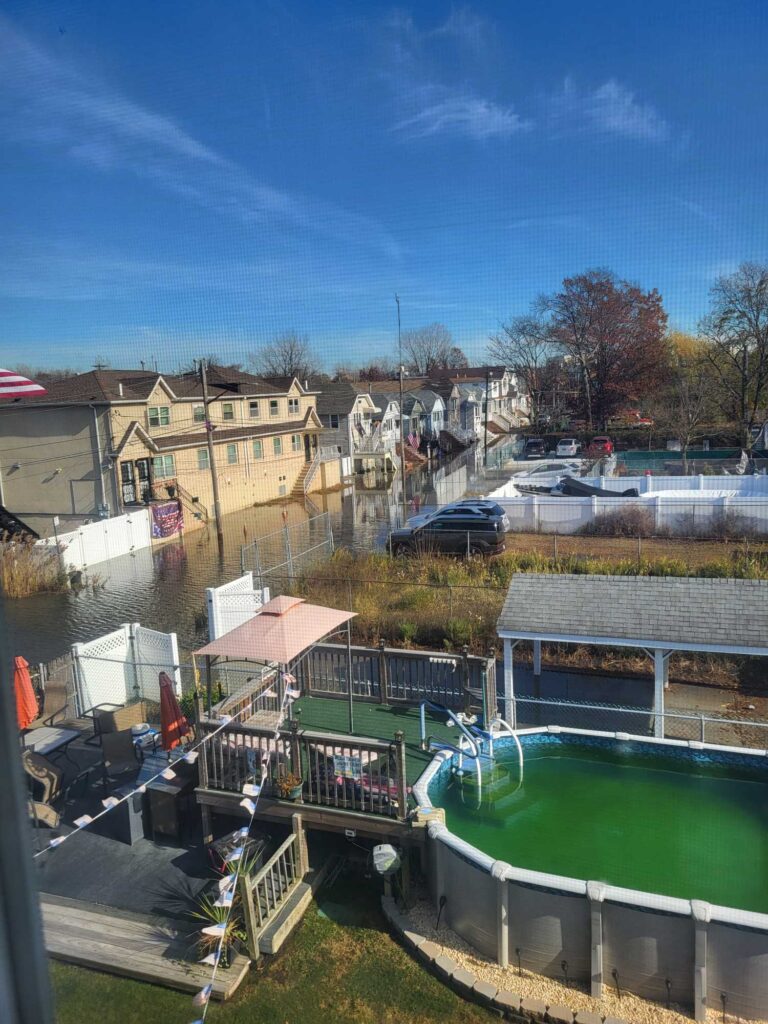 a group of buildings with a pool (MyCoast AI)
