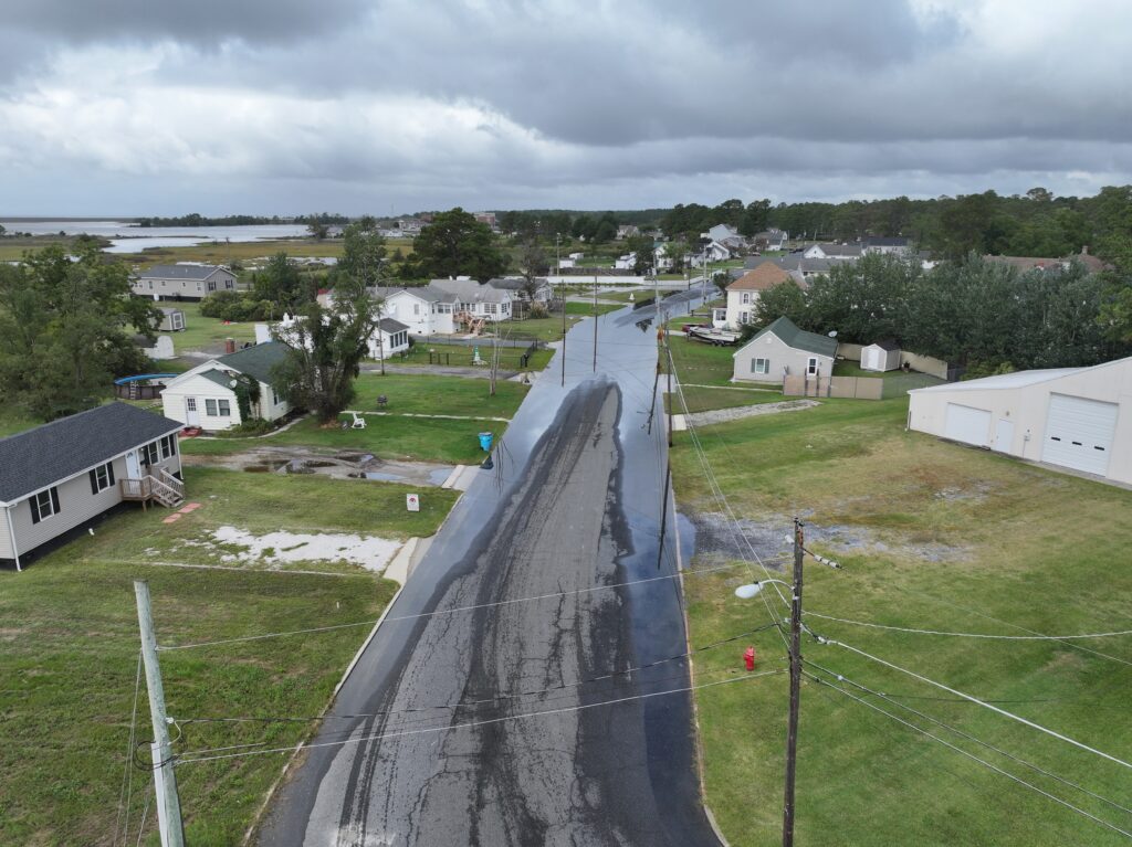 a road with houses on the side (MyCoast AI)