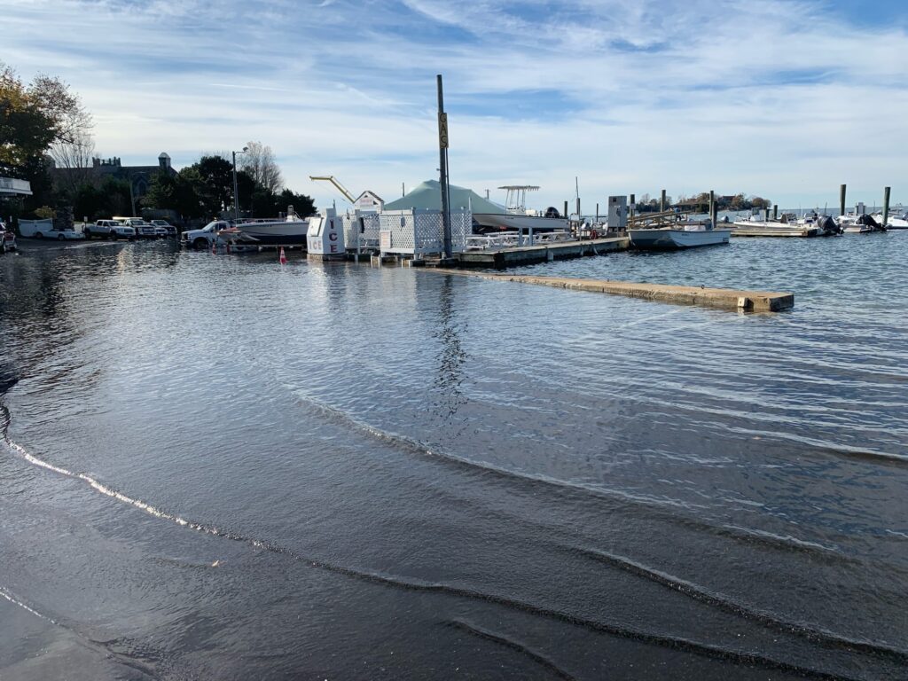 a body of water with boats in it and buildings in the background (MyCoast AI)