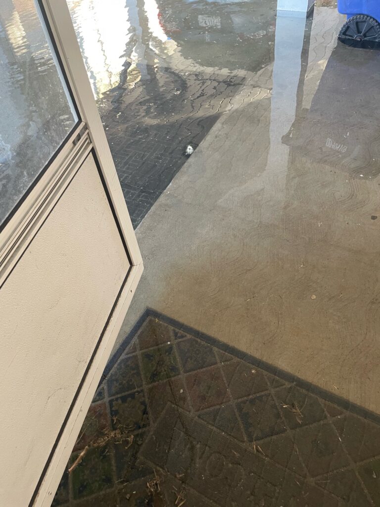 a view of a street through a window (MyCoast AI)