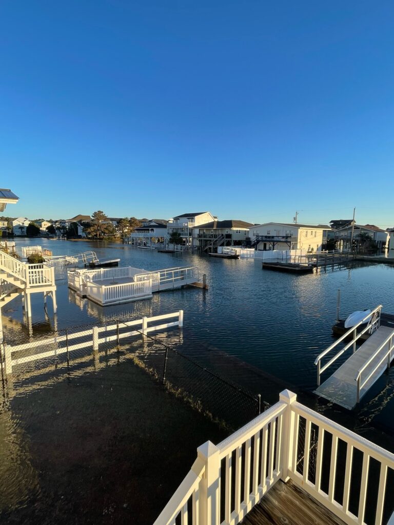a body of water with boats in it and buildings around it (MyCoast AI)