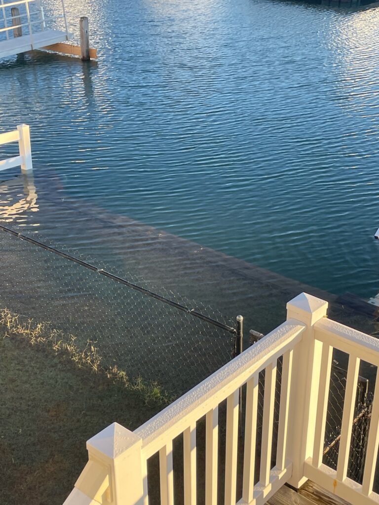 a deck overlooking a body of water (MyCoast AI)