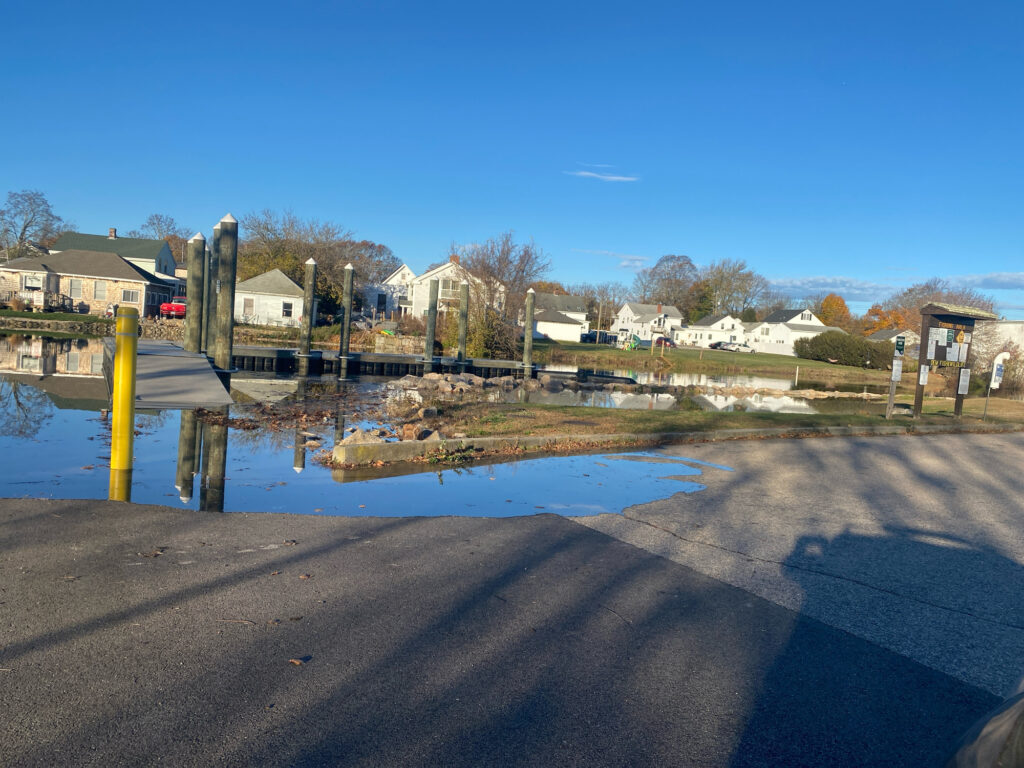 a body of water with houses along it (MyCoast AI)