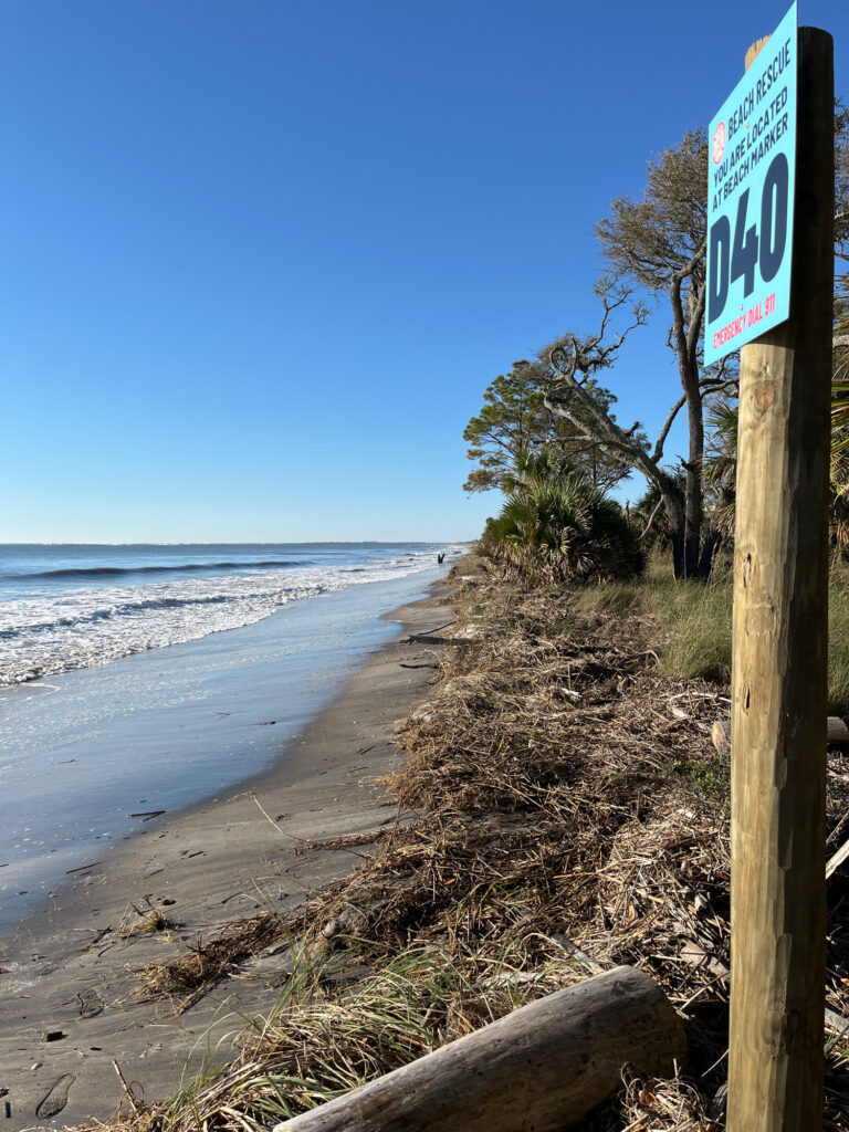 a beach with a sign (MyCoast AI)
