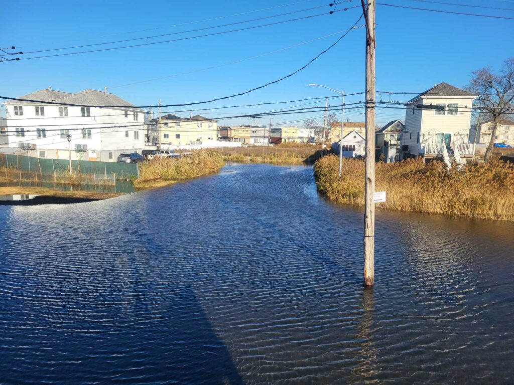 a body of water with houses along it (MyCoast AI)