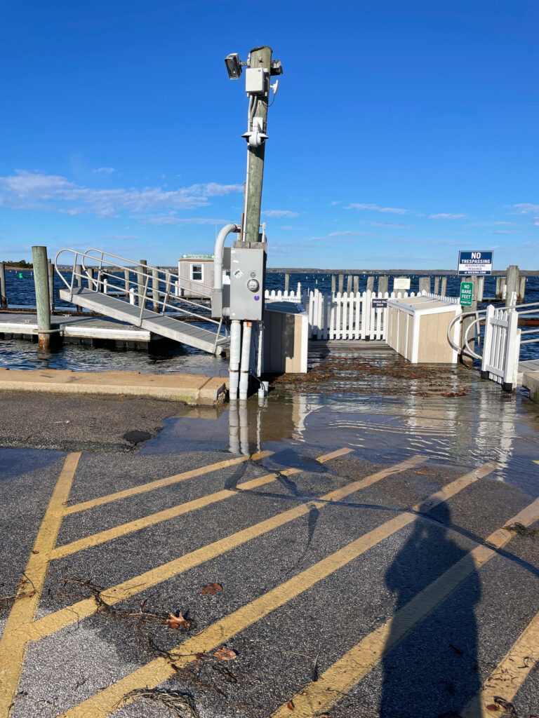 a large metal structure with a metal pole on a dock (MyCoast AI)