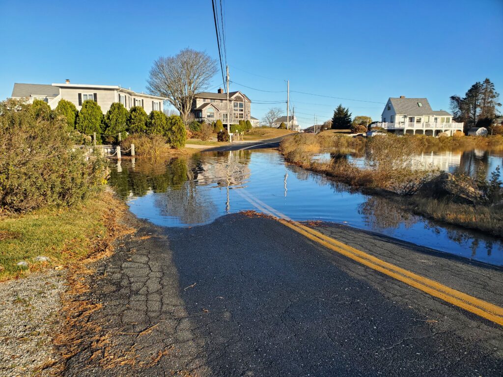 a river with a road and houses along it (MyCoast AI)