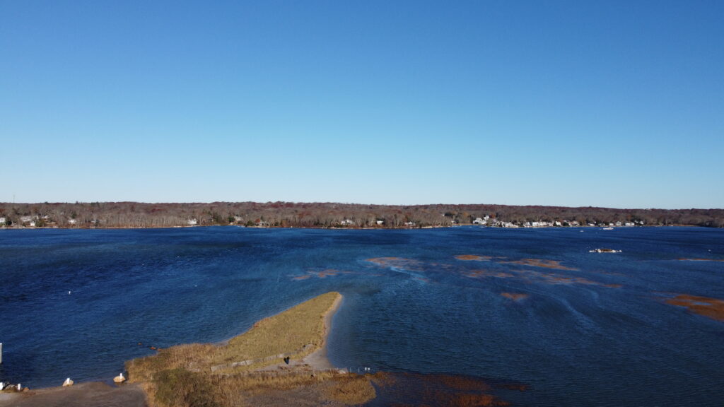 a body of water with land in the background (MyCoast AI)