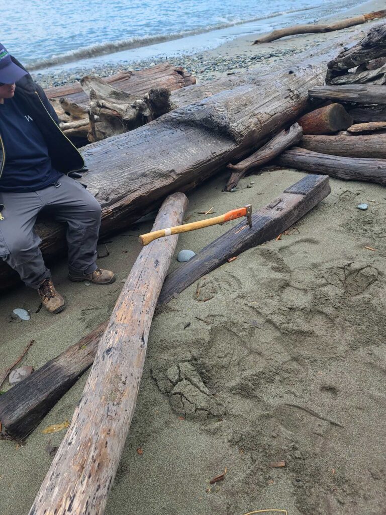 a man sitting on a beach (MyCoast AI)