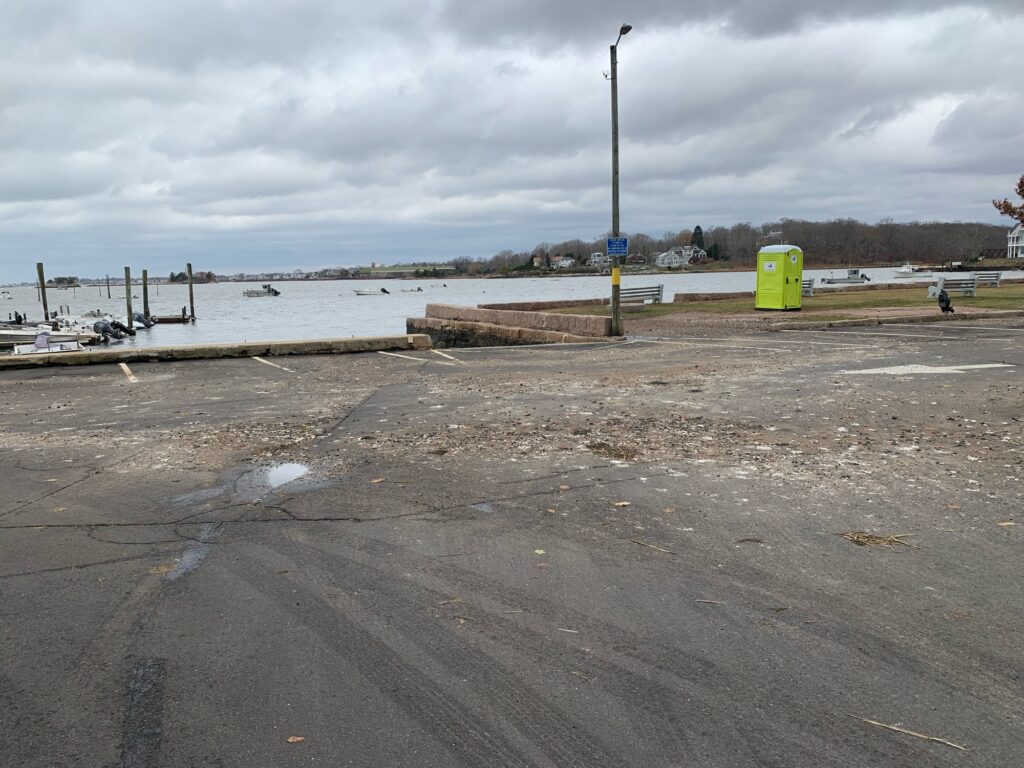 a concrete area with a body of water in the background (MyCoast AI)