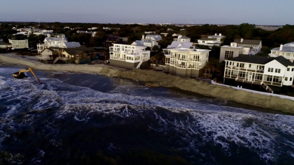 a body of water with buildings along it (MyCoast AI)