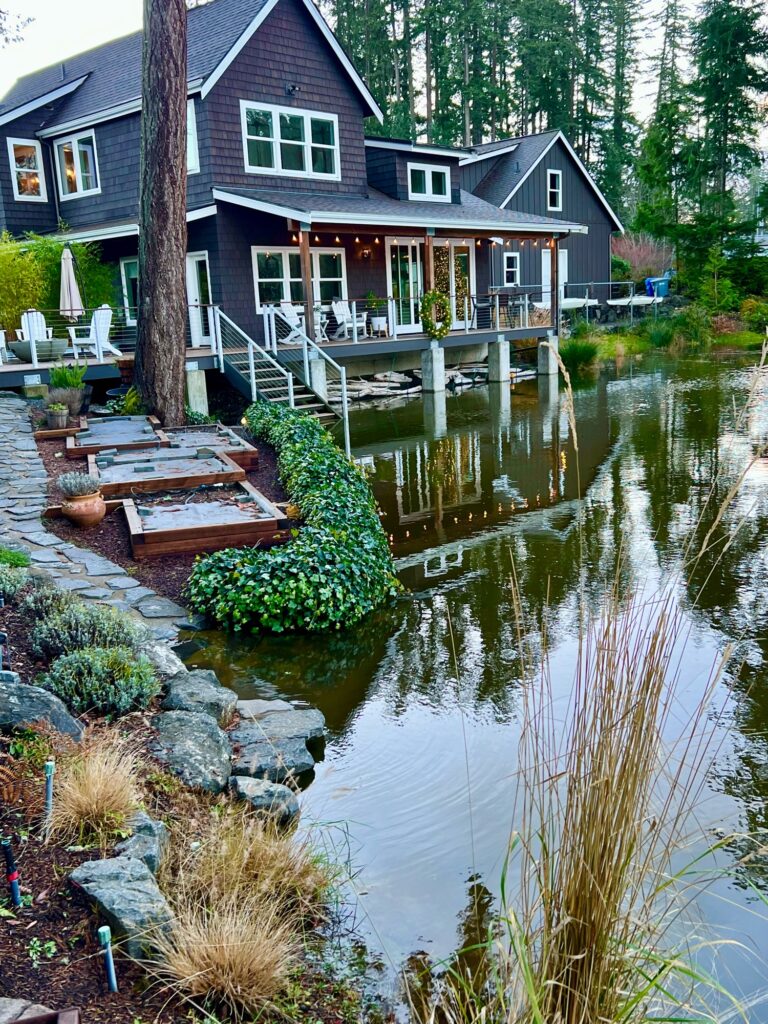 a house with a pond in the front (MyCoast AI)