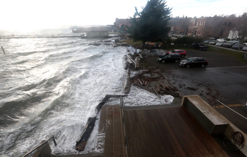 a body of water with cars parked along it (MyCoast AI)