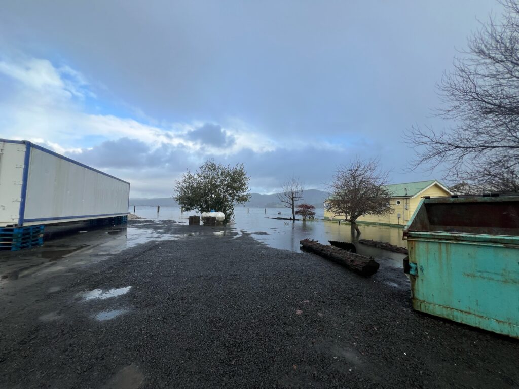 a group of buildings next to a body of water (MyCoast AI)