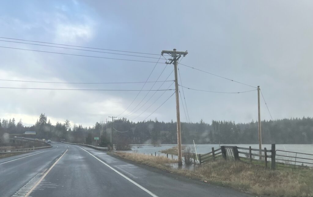 a road with power lines on the side (MyCoast AI)