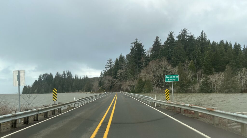 a road with a bridge over it (MyCoast AI)