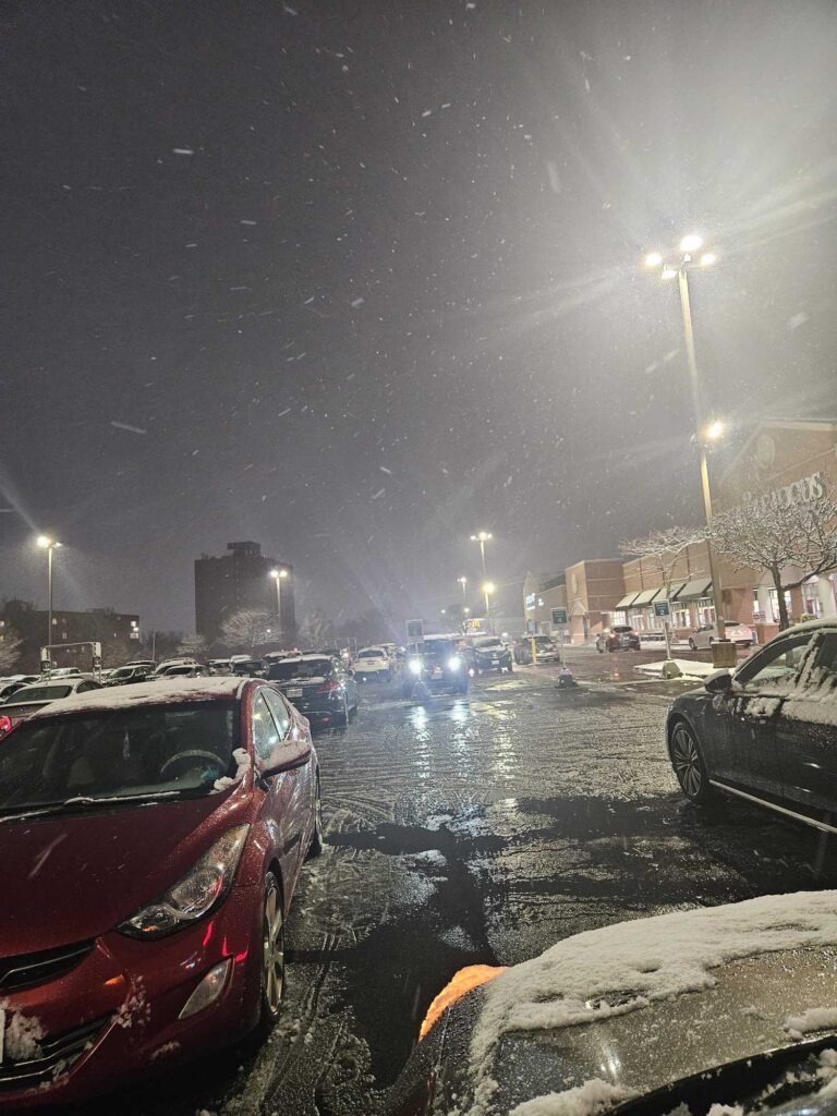 cars parked on a street at night (MyCoast AI)