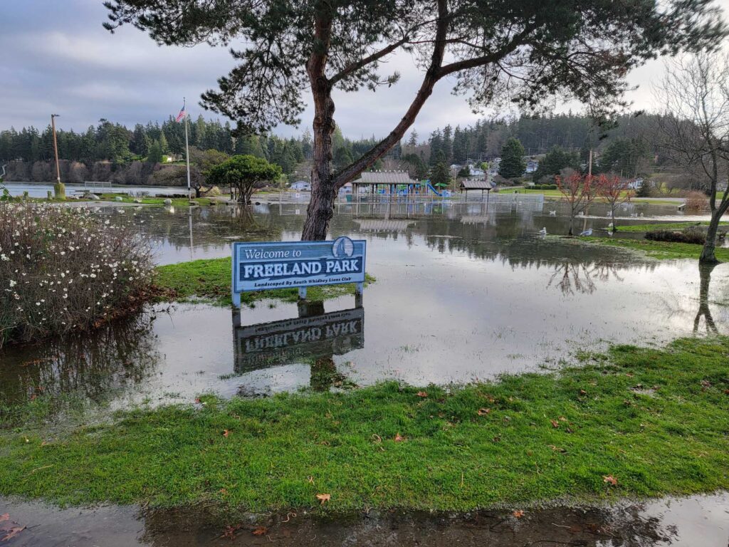 a sign in a flooded area (MyCoast AI)