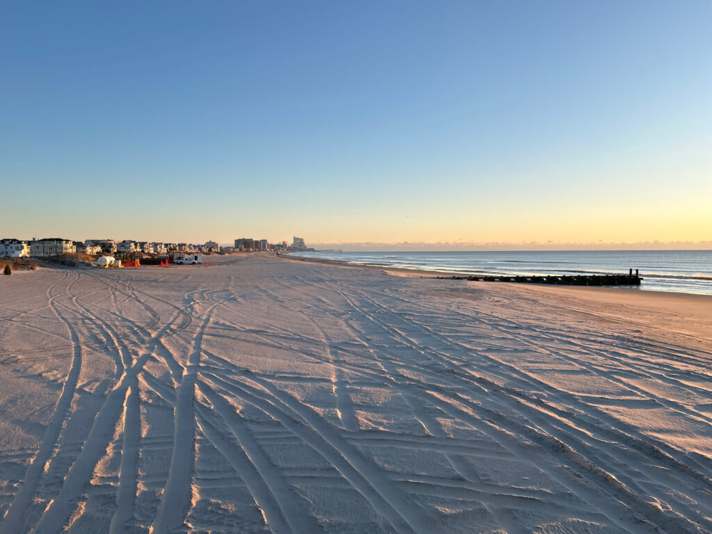 a snowy beach with a body of water in the background (MyCoast AI)