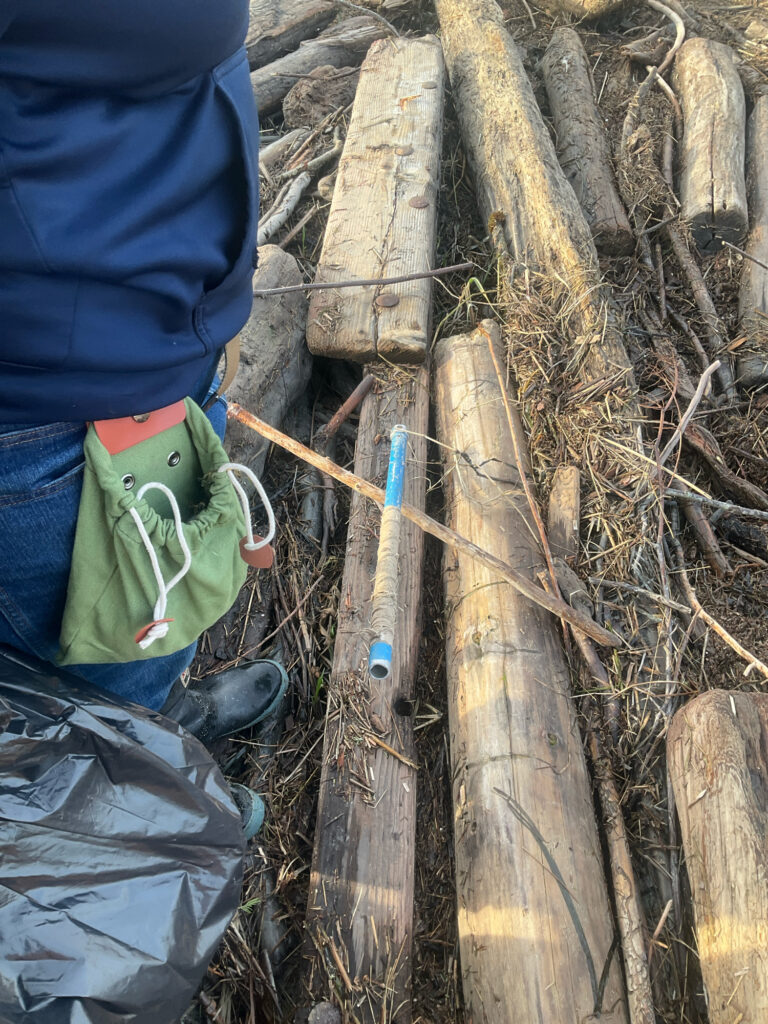 a person holding a tool (MyCoast AI)