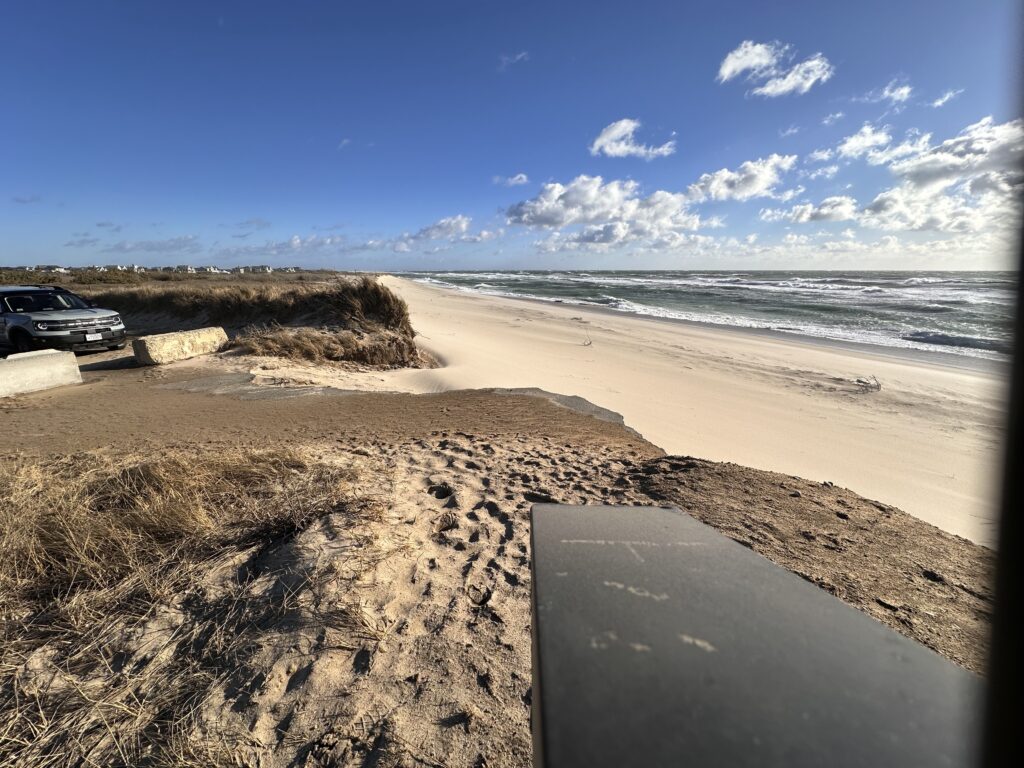 a car parked on a beach (MyCoast AI)