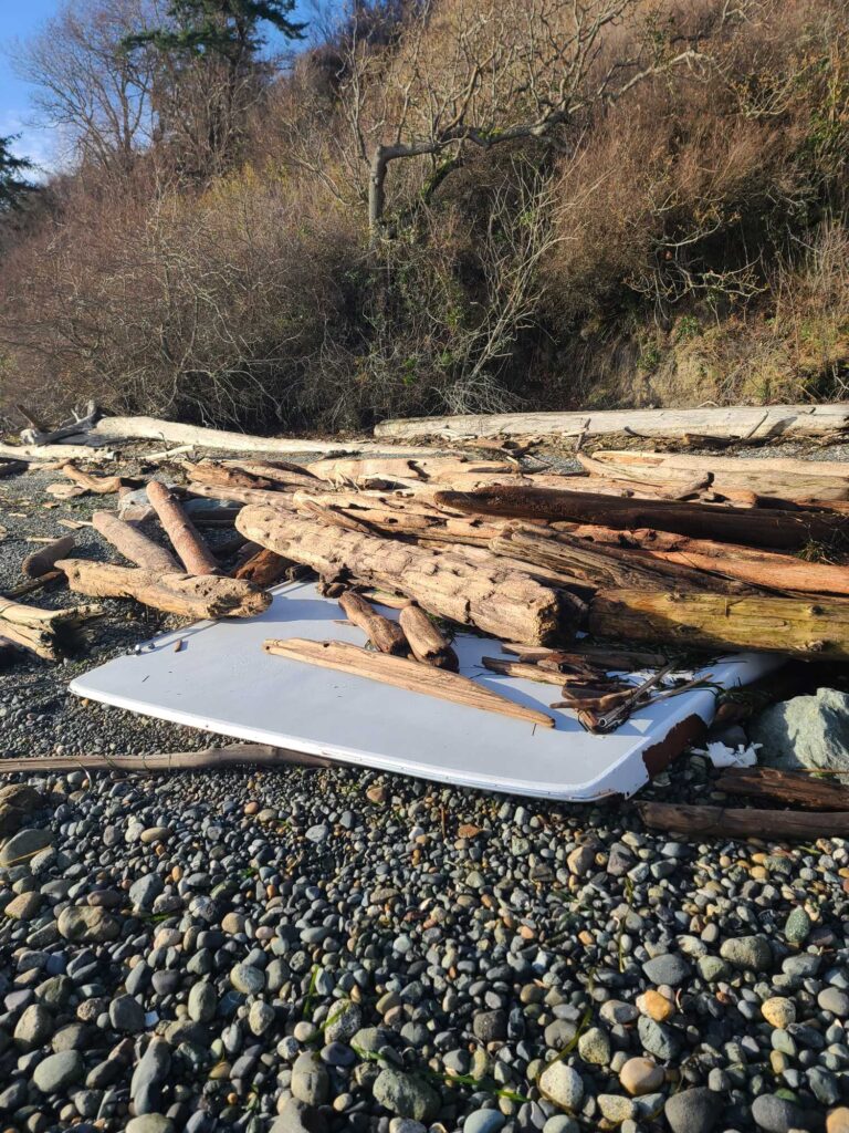 a boat on a rocky shore (MyCoast AI)