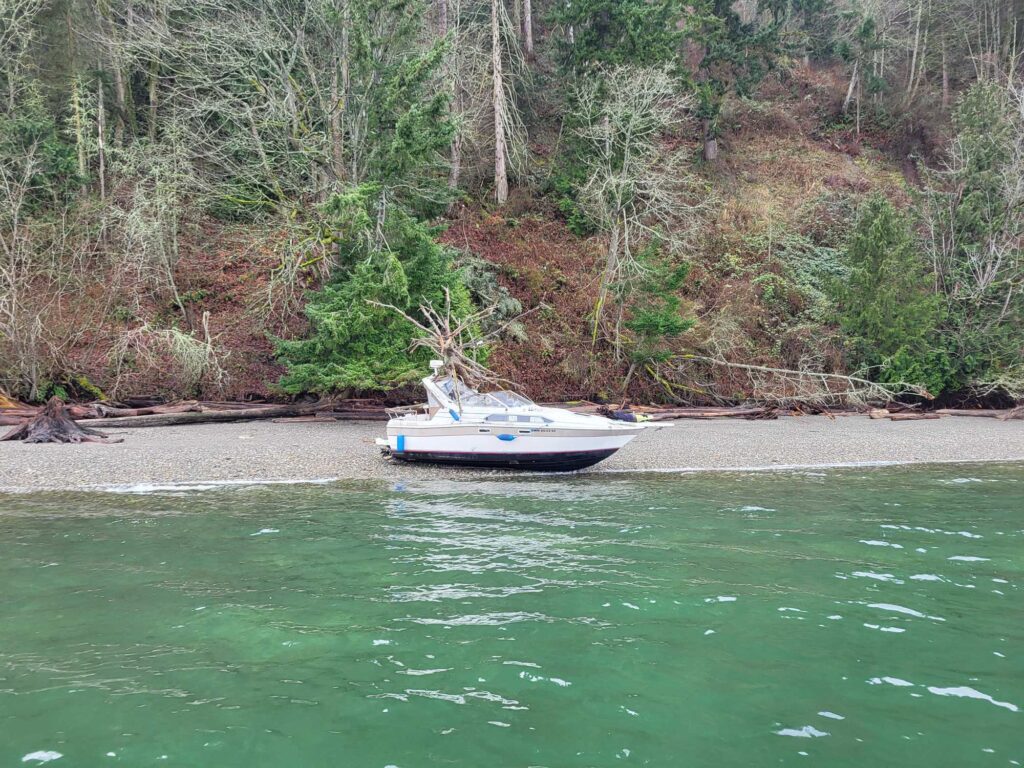 a boat sits in the water (MyCoast AI)