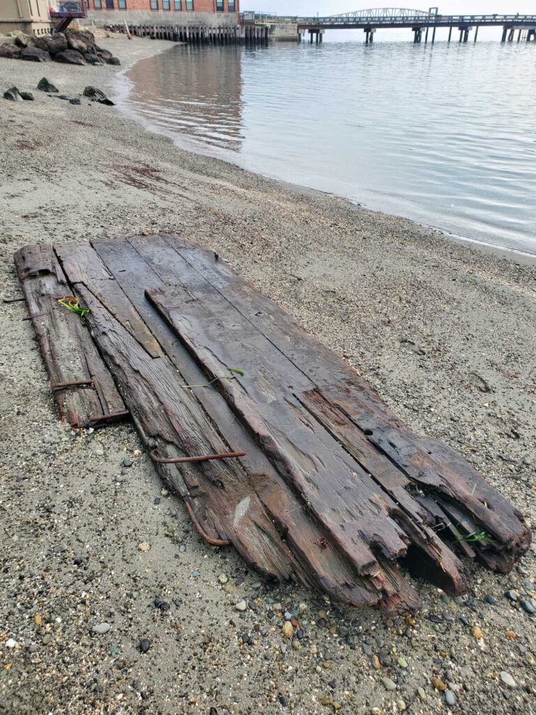 a wooden boat on the shore (MyCoast AI)