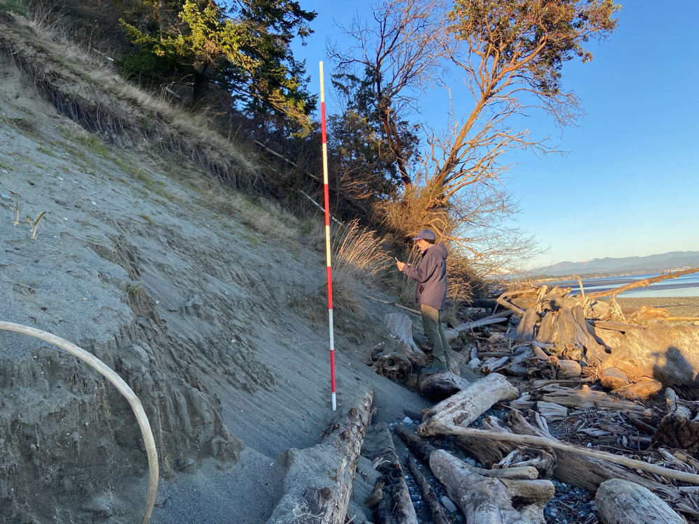 a person standing on a rocky hillside (MyCoast AI)