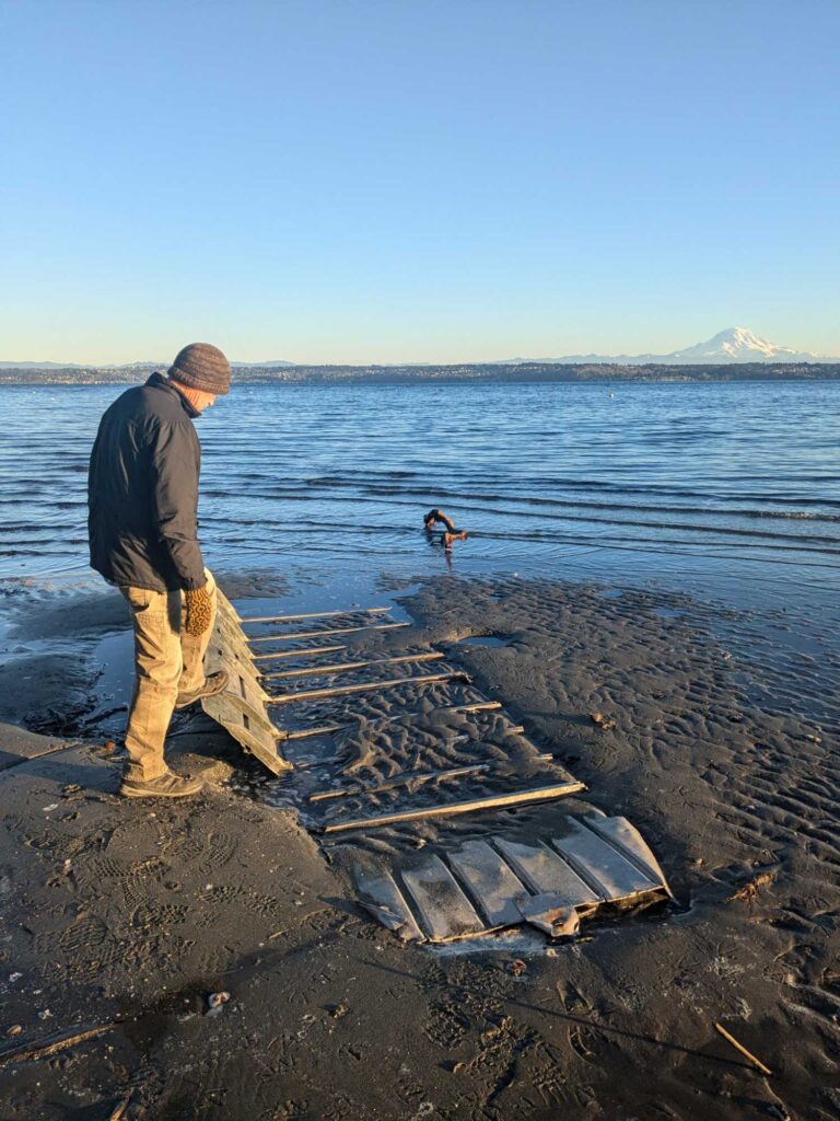 a man standing on a beach (MyCoast AI)