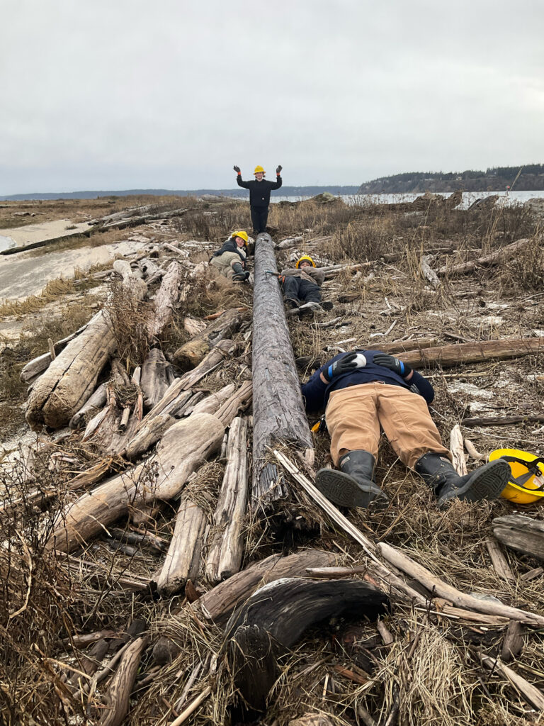 a group of people working on a fire (MyCoast AI)