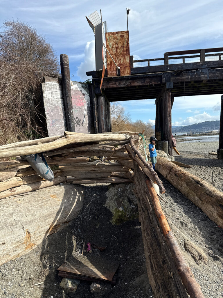 a person standing next to a bridge (MyCoast AI)