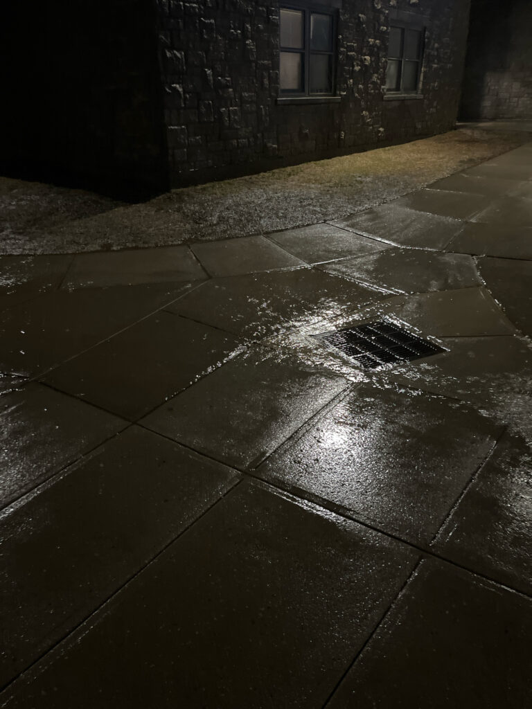 a wet stone floor (MyCoast AI)