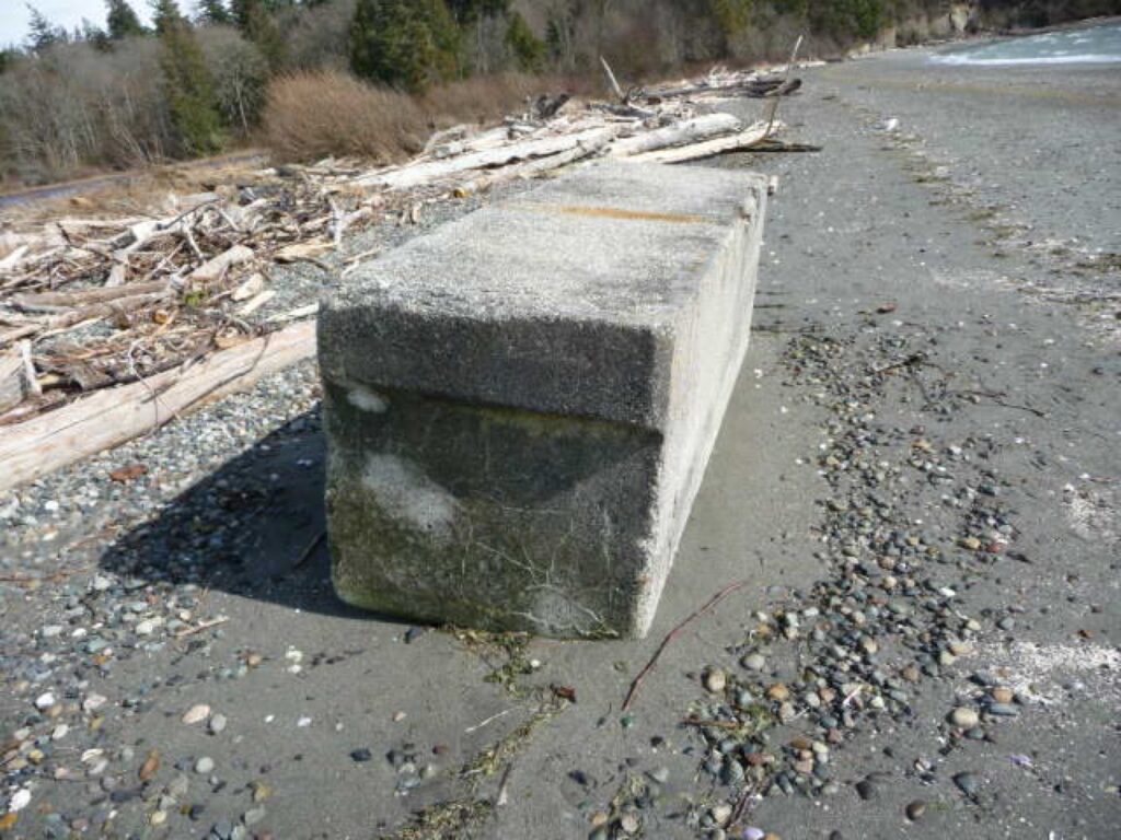 a concrete block on a road (MyCoast AI)