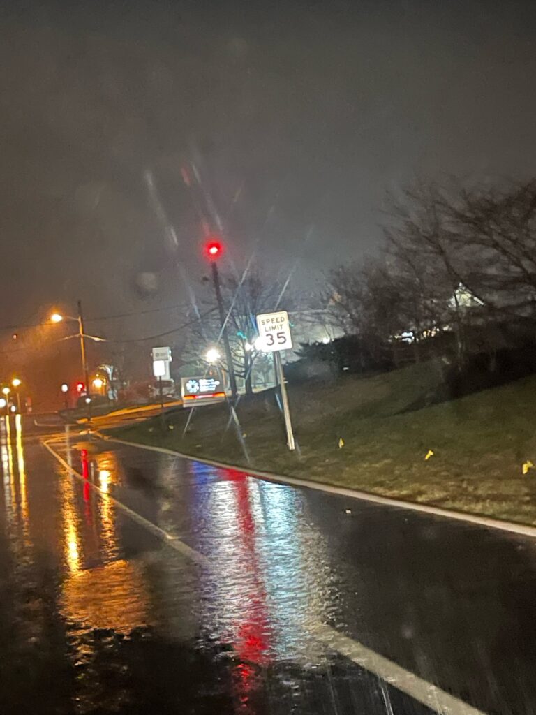 a rainy street at night (MyCoast AI)