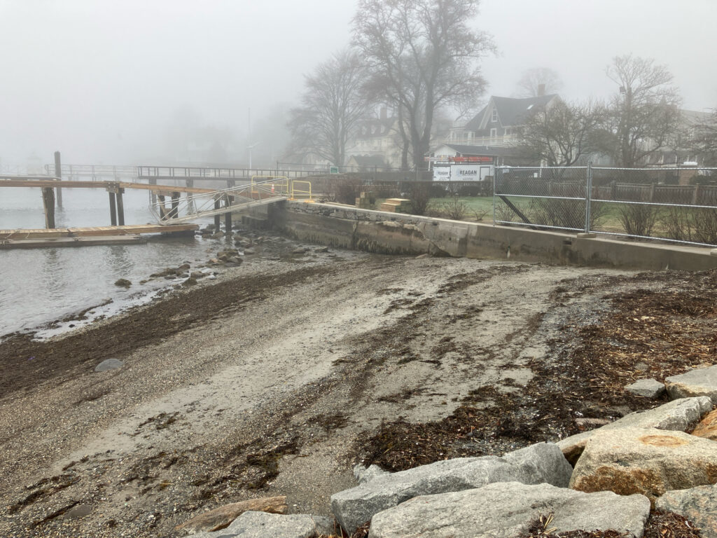 a river with rocks and a bridge (MyCoast AI)