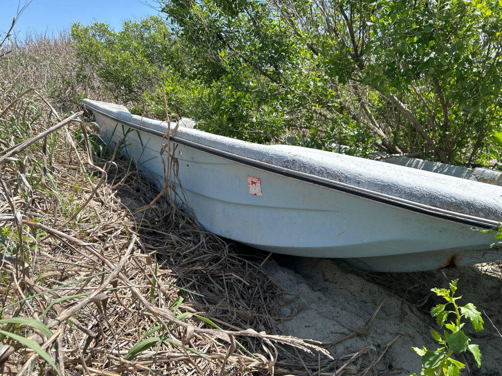a boat on the ground (MyCoast AI)