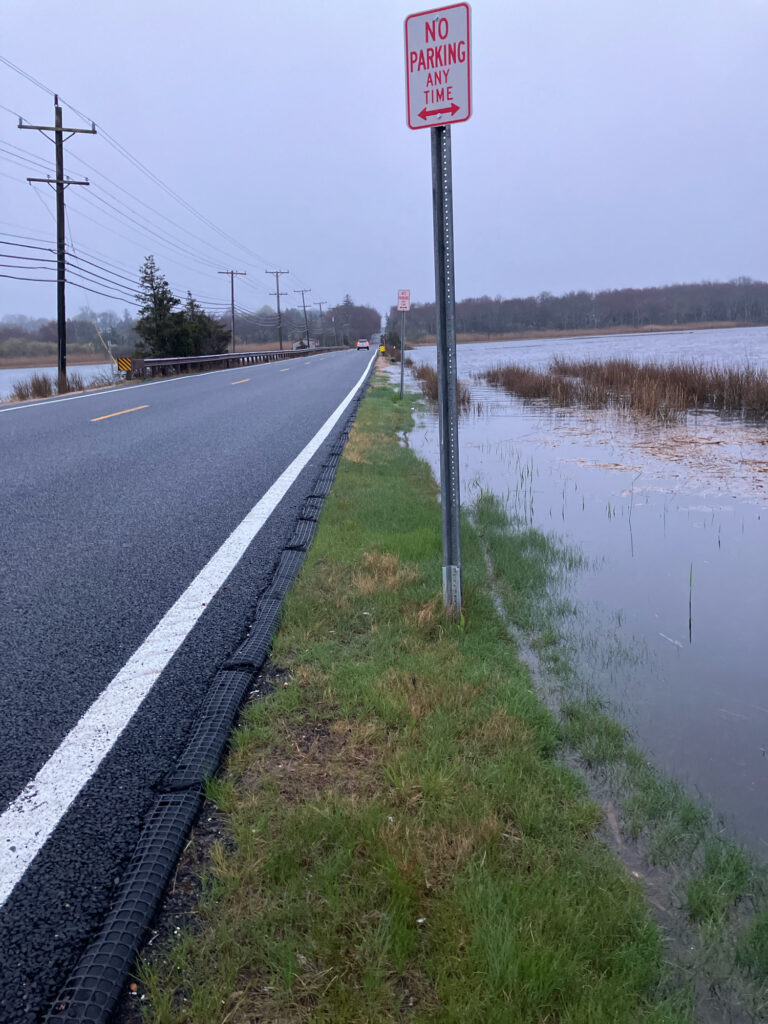 a road with a sign on it (MyCoast AI)