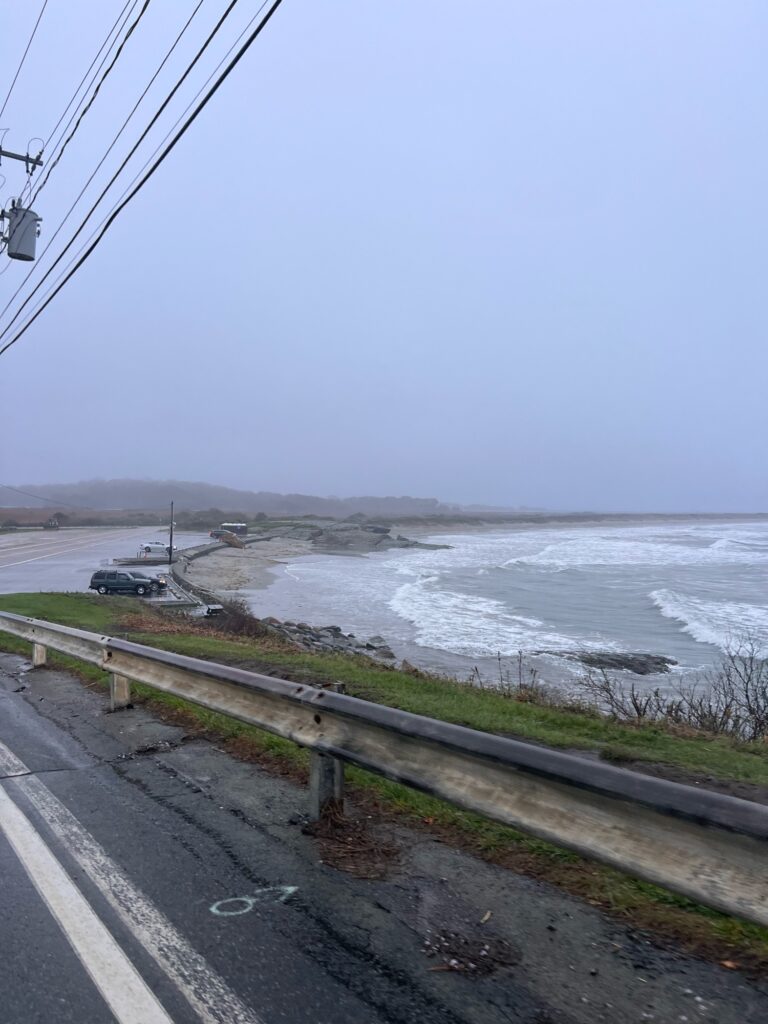 a road next to a body of water (MyCoast AI)
