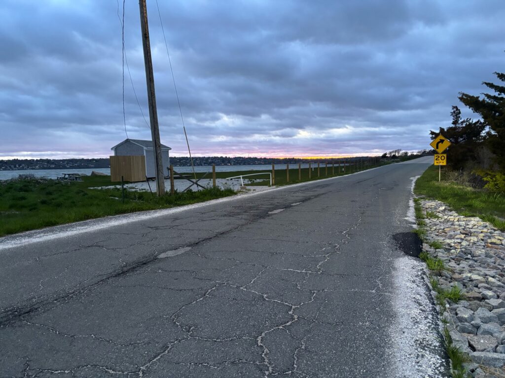 a road with a building on the side (MyCoast AI)