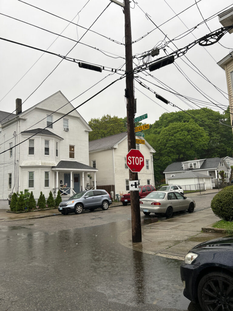 a stop sign on a pole (MyCoast AI)