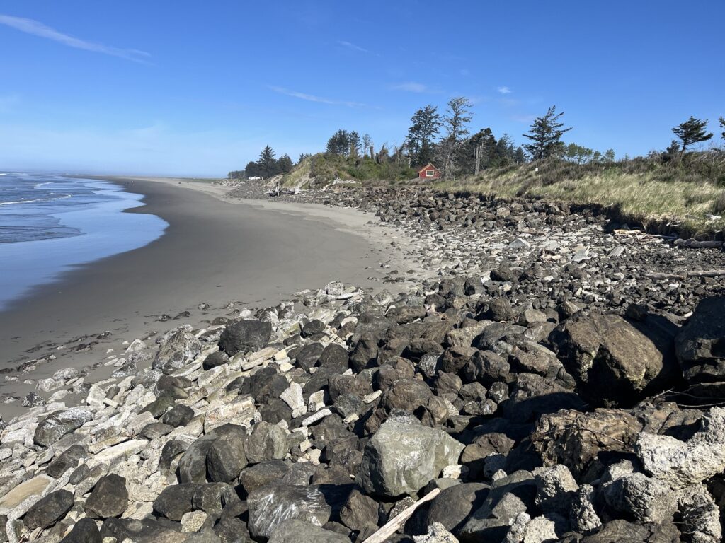 a rocky beach with a sandy beach (MyCoast AI)