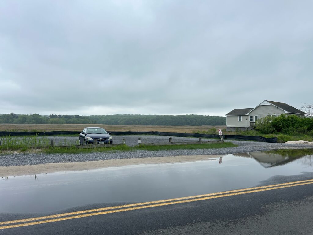 a car driving on a road (MyCoast AI)