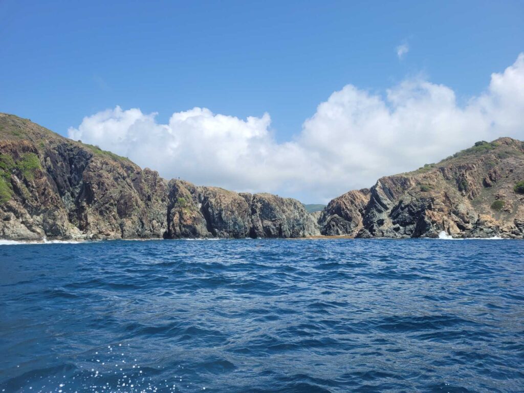 a body of water with mountains in the background (MyCoast AI)